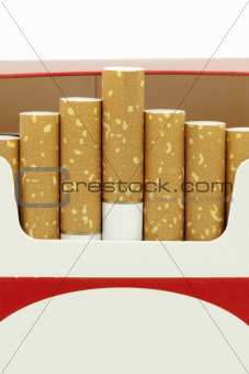 Cigarettes in opened cardboard box