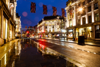 Illuminated Rainy Street in London at Night, United Kingdom