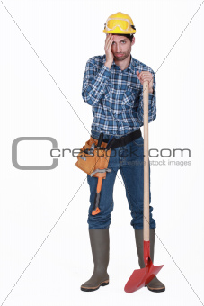 Tired man with spade