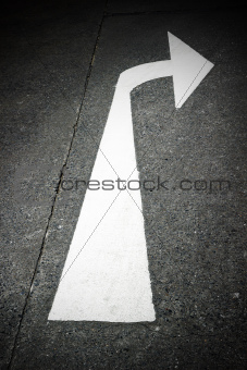 Turn right arrow traffic symbol on street
