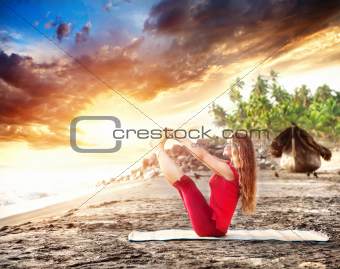 Yoga at sunset beach