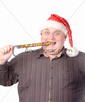 Cheerful fat man in Santa hat