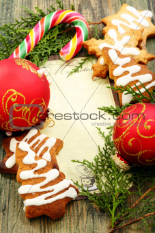 Christmas balls, gingerbread and candy cane.