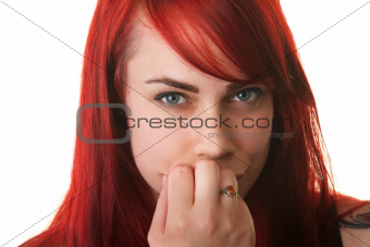 Skeptical Woman with Fingers on Mouth
