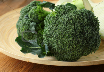 Natural organic broccoli on a wooden table
