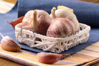organic garlic in a basket on the table