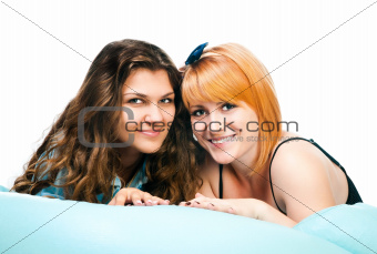 two girls on pillow