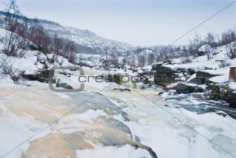 Frozen river in tundra 