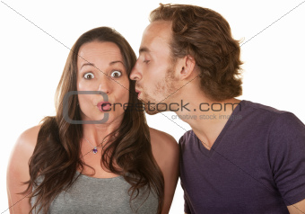 Astonished Woman Kissed by Man