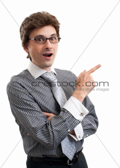 surprised young business man pointing at something interesting
