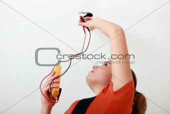 Female electrician at work