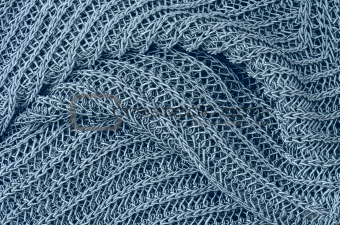 close up blue knitted pullover background