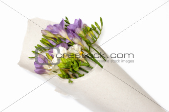 bouquet of freesia in the paper