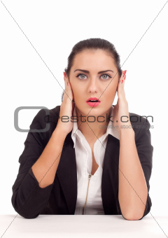 Business woman covering her ears