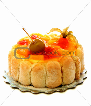 Cake with exotic fruit and jelly.