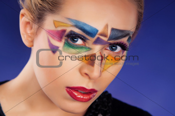 portrait of beautiful girl with triangles on the face