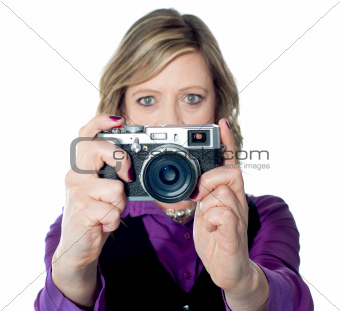Portrait of a beautiful woman with camera