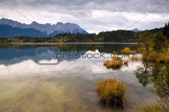 calm landscape with wild lake and mountains