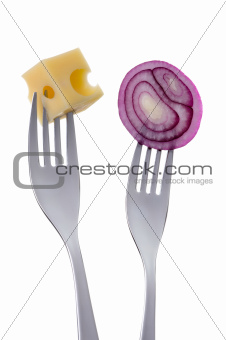 red onion and cheese on forks against white