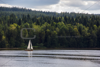 Sailboat on lake.