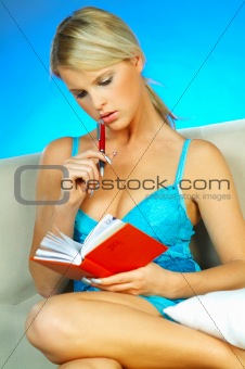 Blonde woman with datebook