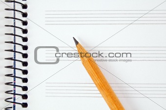 Music sheet and pencil