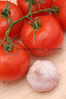 Dewy Tomatoes & Garlic on Wood