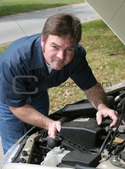 Handsome Mechanic Under Hood