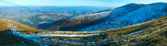 Autumn  mountain panorama with first winter snow