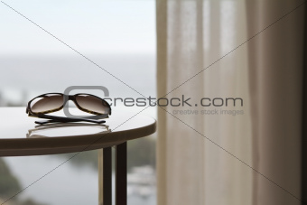 Contemporary apartment with sunglasses and view