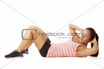 Young woman doing sit-ups
