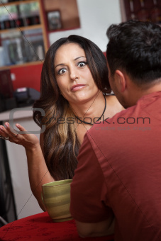 Frustrated Woman in Cafe