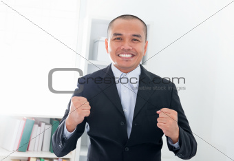 Excited Southeast Asian businessman 