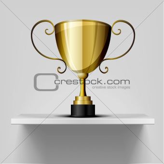 gold trophy on a shelf