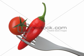chili and tomato on a fork
