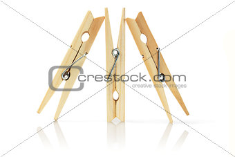 Three Wooden Clothes Pegs
