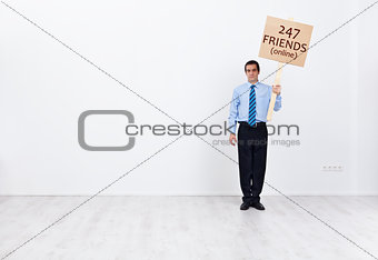 Lonely businessman with many online friends