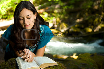 Young woman reading bible