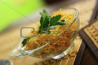 Delicious salade with onion, parsley and cheese.