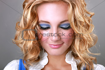 Makeup on a Blonde Woman Looking Down