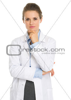 Portrait of thoughtful woman in white robe