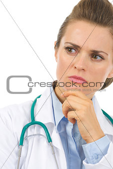 Closeup on thoughtful medical doctor woman