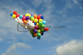 a lot of balloons of flying in sky