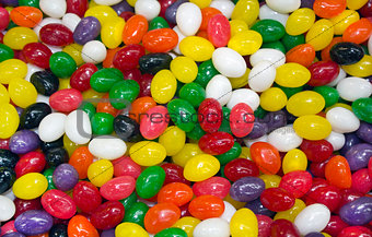 multi colored candy in the form of peas