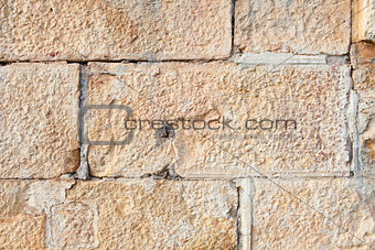 Wall built of rectangular sandstone bricks