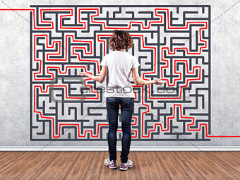 Girl before a labyrinth