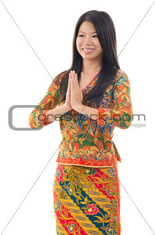 Southeast Asian woman greeting 