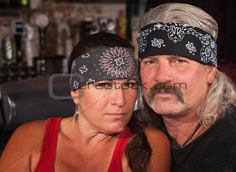 Serious Middle Aged Couple in Bar