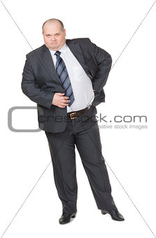 Fat businessman glowering at the camera