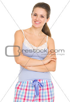 Portrait of smiling young woman in pajamas